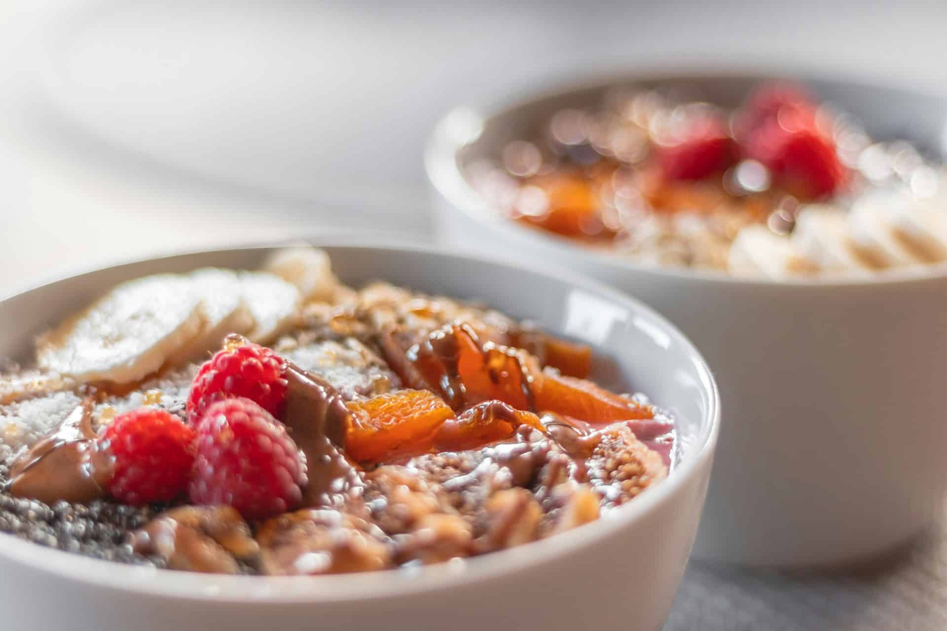 Bakes oats in ramekins with fruit on top. Blog image for post "Baked Breakfasts for Lazy Weekend Mornings"